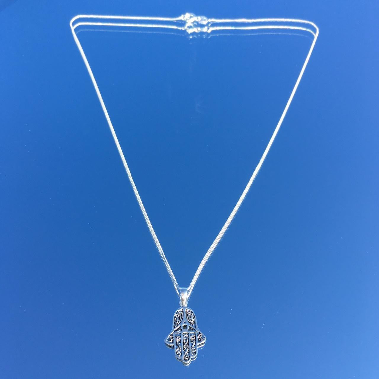 THE LUCKY HAMSA