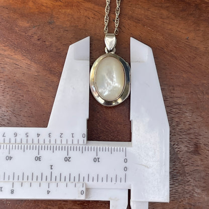 Unreleased: Vintage Sterling Silver Small Mother Of Pearl Locket