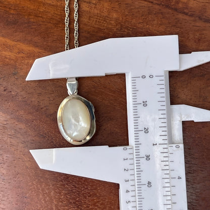 Unreleased: Vintage Sterling Silver Small Mother Of Pearl Locket