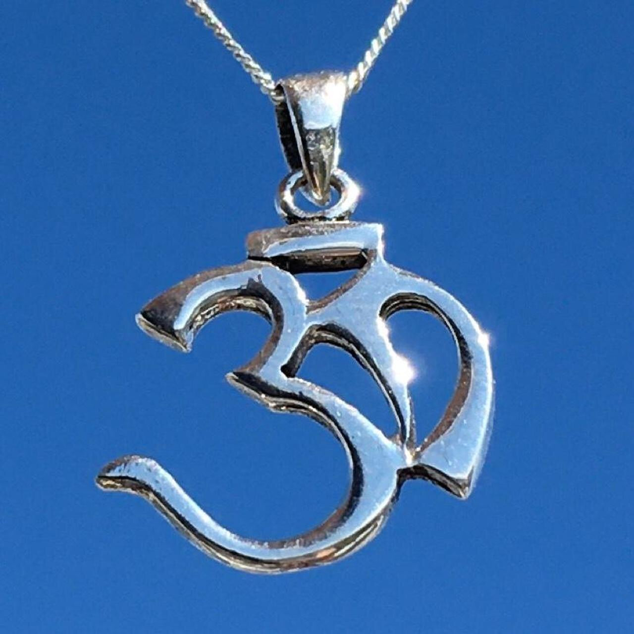 THE SACRED OM