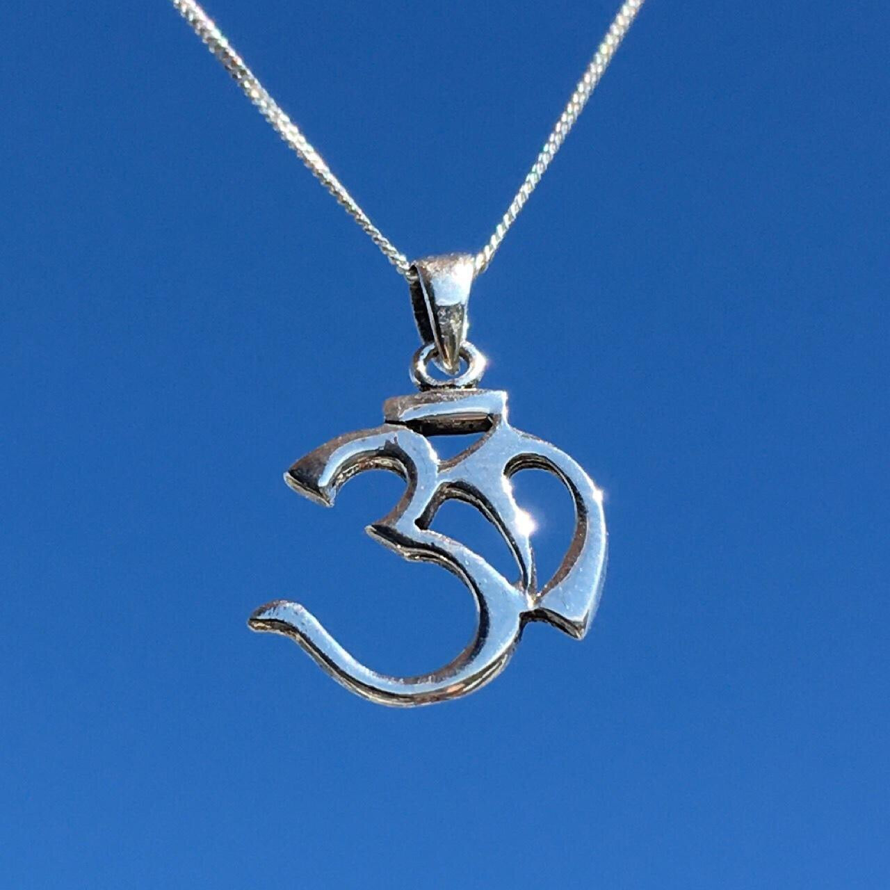 THE SACRED OM
