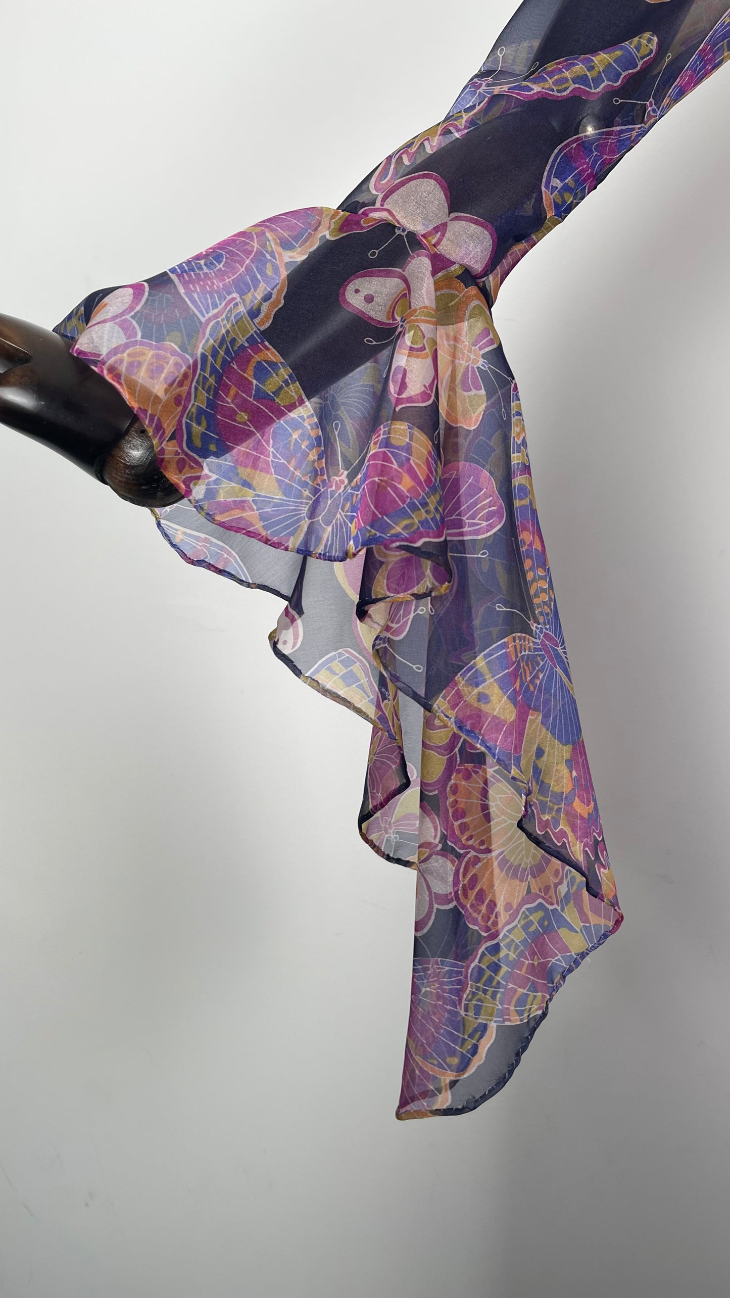 THE PURPLE BUTTERFLY